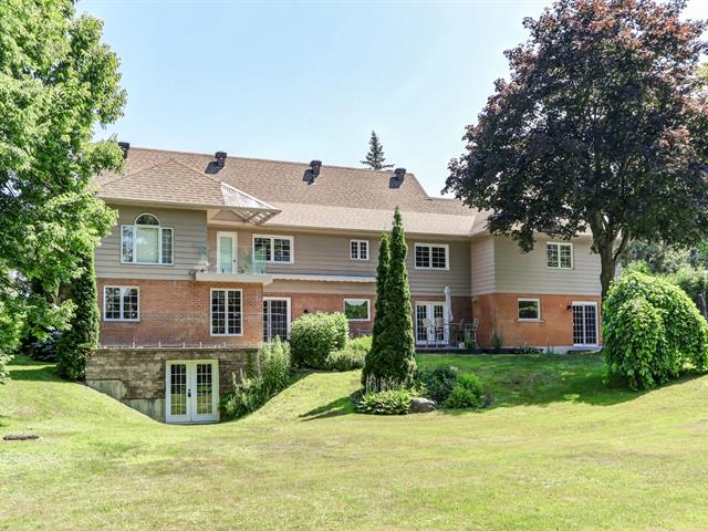 Maison à étages à vendre, Laval (Laval-sur-le-Lac)